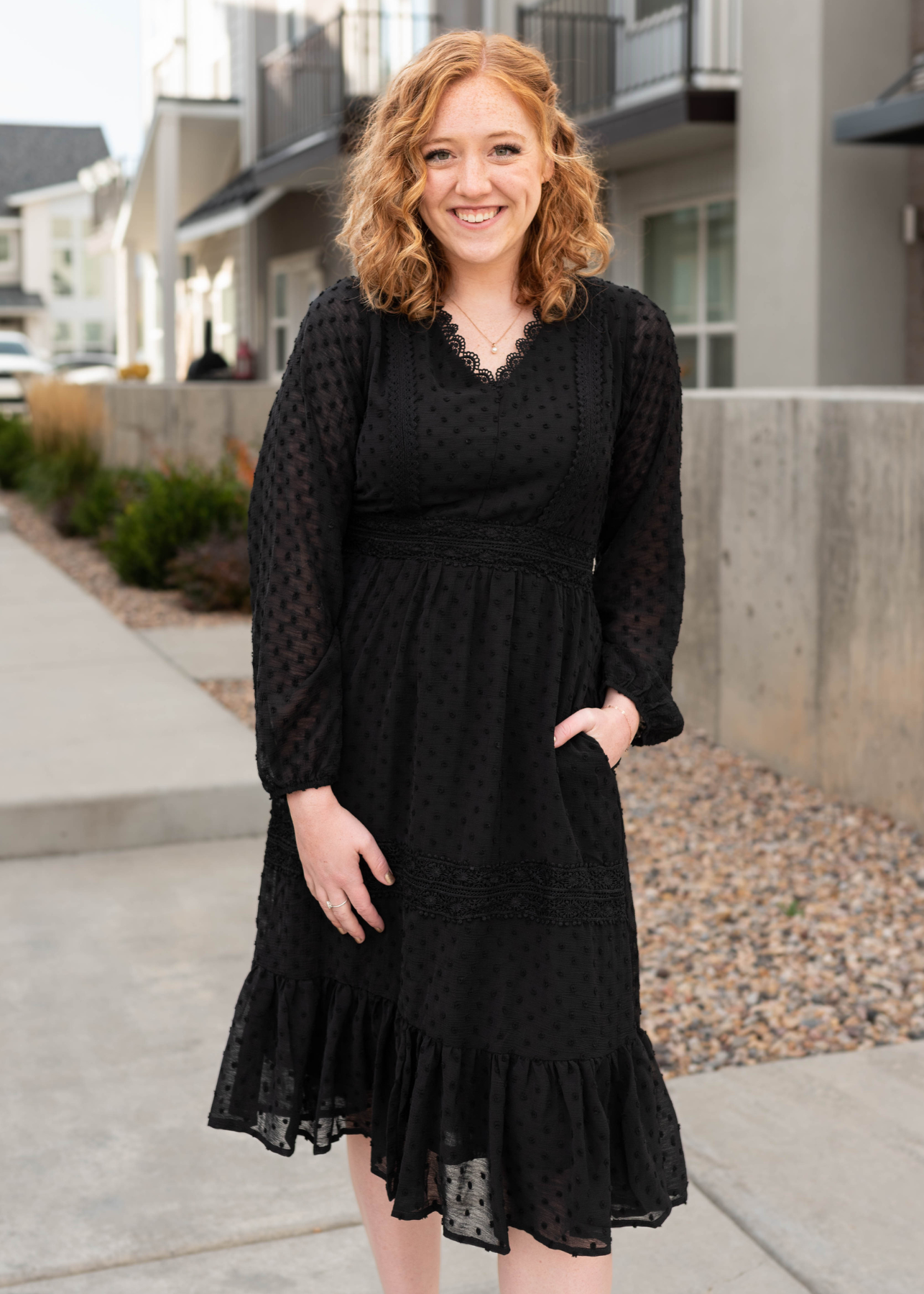 Long sleeve black textured dress with pockets