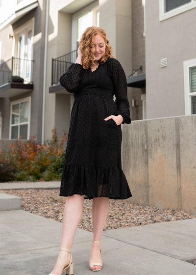 Knee length black textured dress