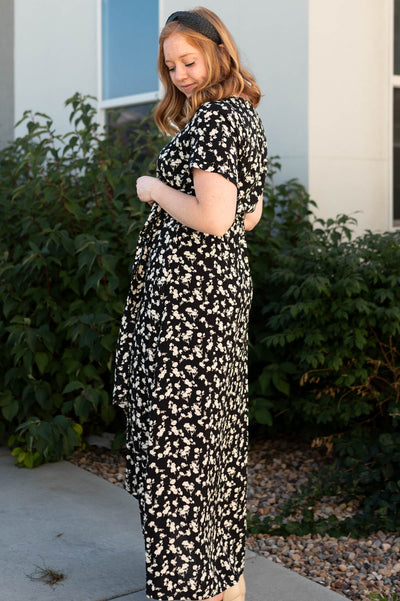 Side view of a black floral dress