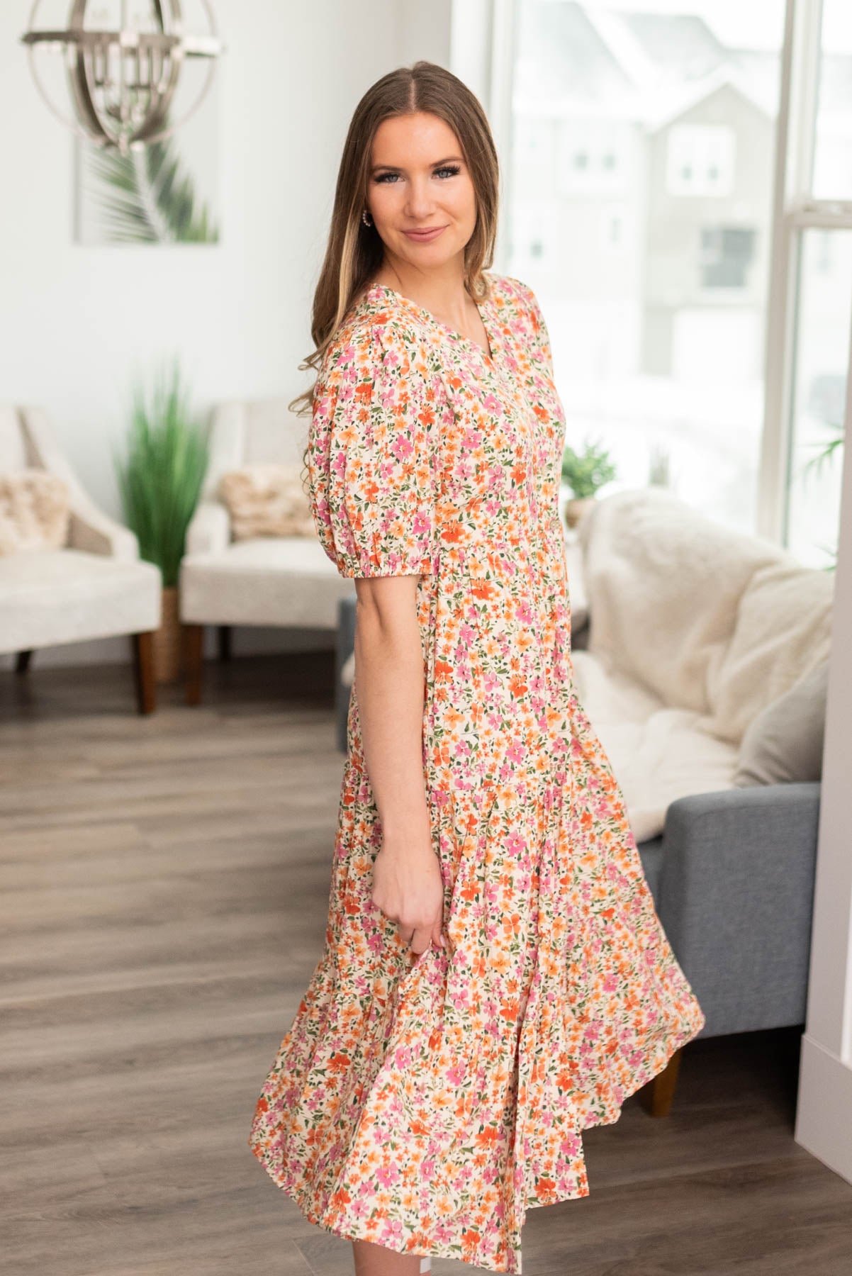 Side view of the apricot floral dress