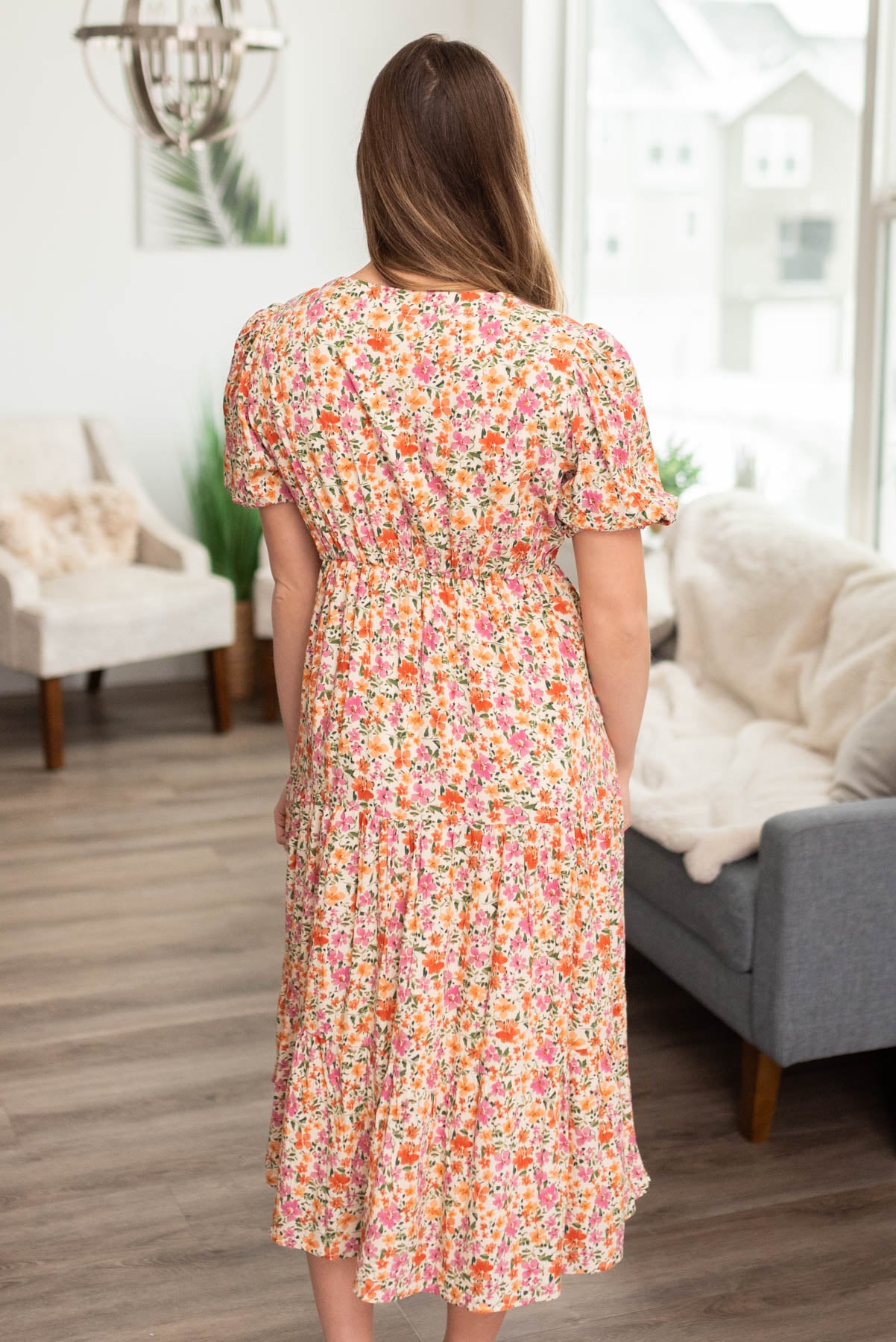 Back view of the apricot floral dress