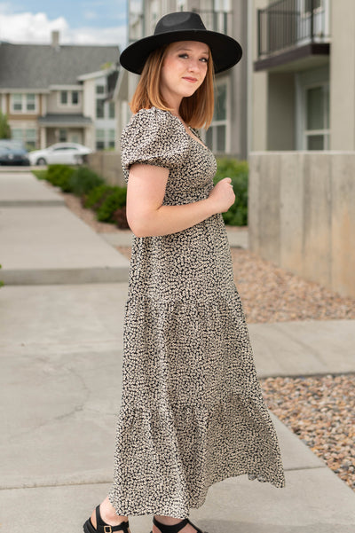 Side view of a black floral dress