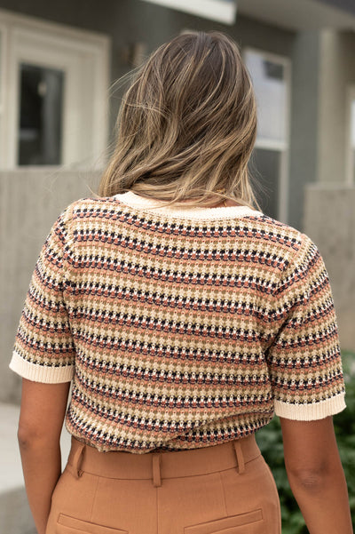 Back view of a olive top