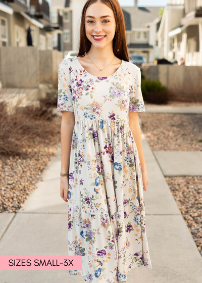 Grey floral dress with short sleeves and open neckline