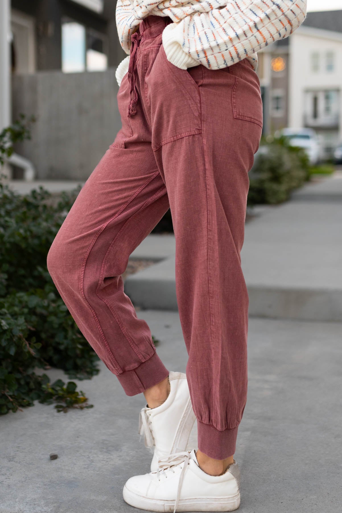Side view of faded plum joggers