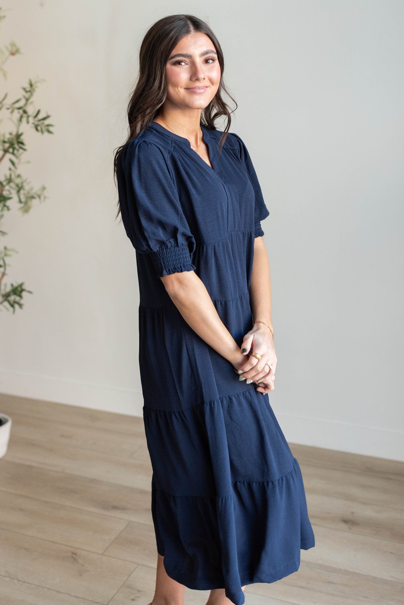 Side view of the navy tiered dress