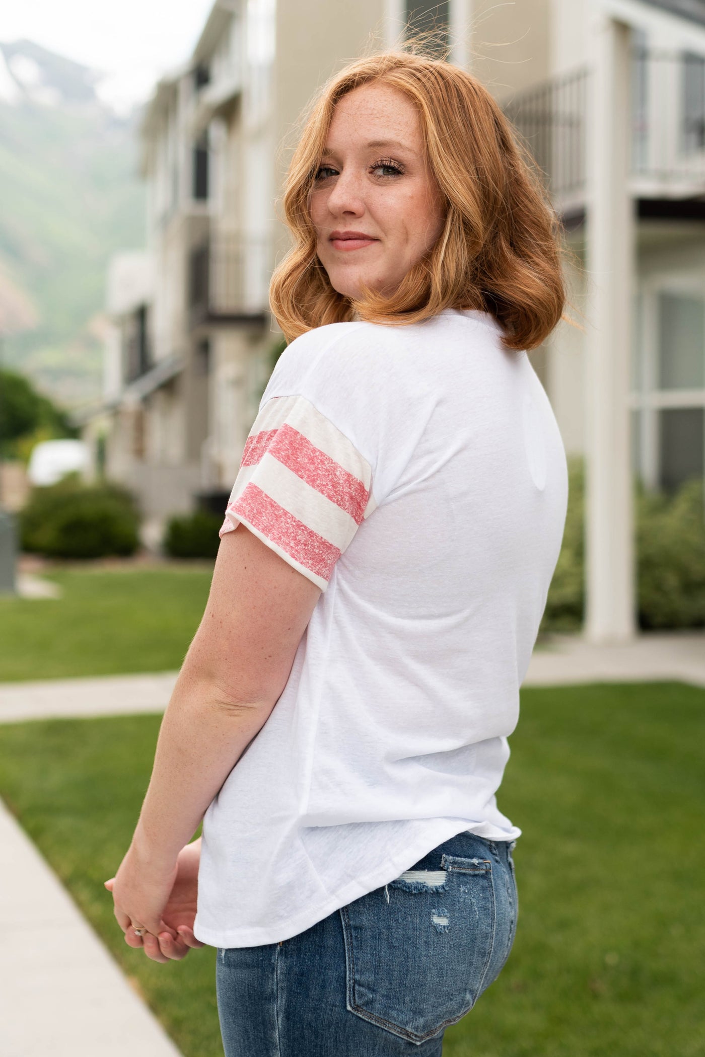 Short sleeve white top with stripes on sleeve