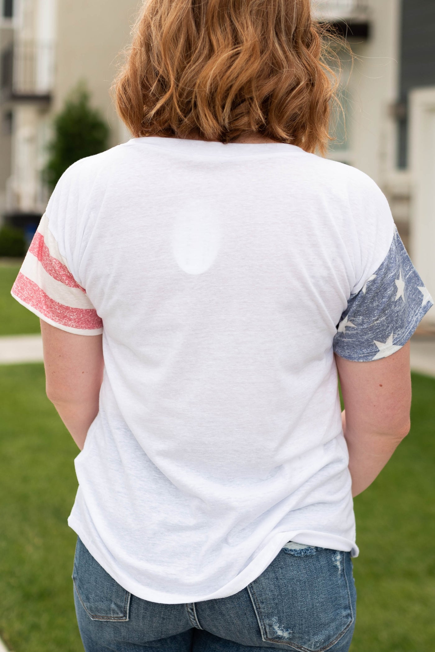 Short sleeve white top with stars and stripes on sleeves