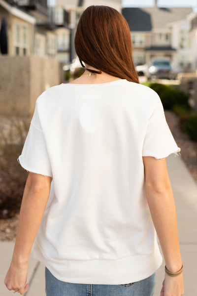 Back view of the white USA top