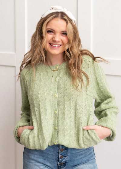 Button up light green puff sleeve sweater with pockets