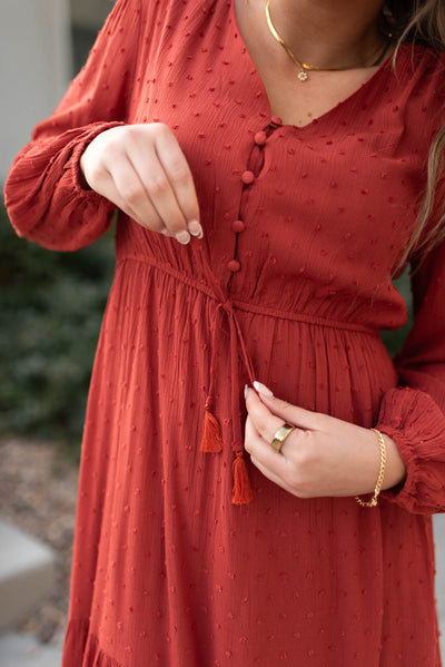 Button up bodice of a brick dress