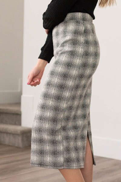 Side view of the black plaid skirt