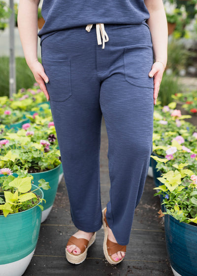 Front view of the navy knit pants
