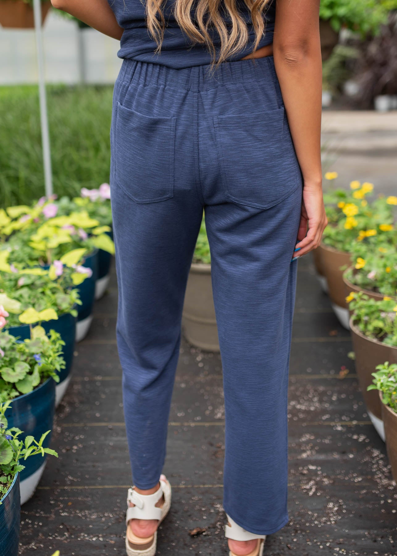 Back view of the navy knit pants