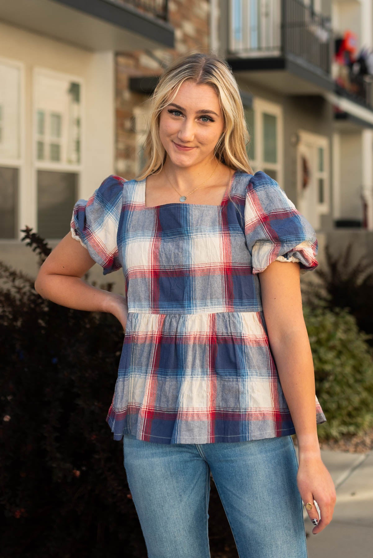 Short sleeve navy plaid top with a square neck
