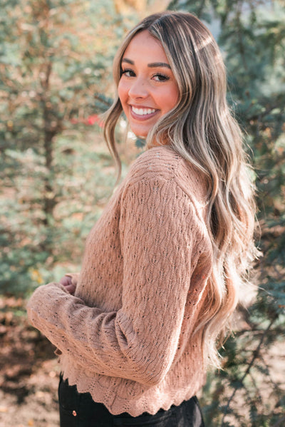 Side view of the taupe cardigan