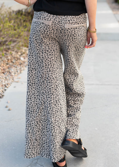 Back view of the ash brown leopard pants