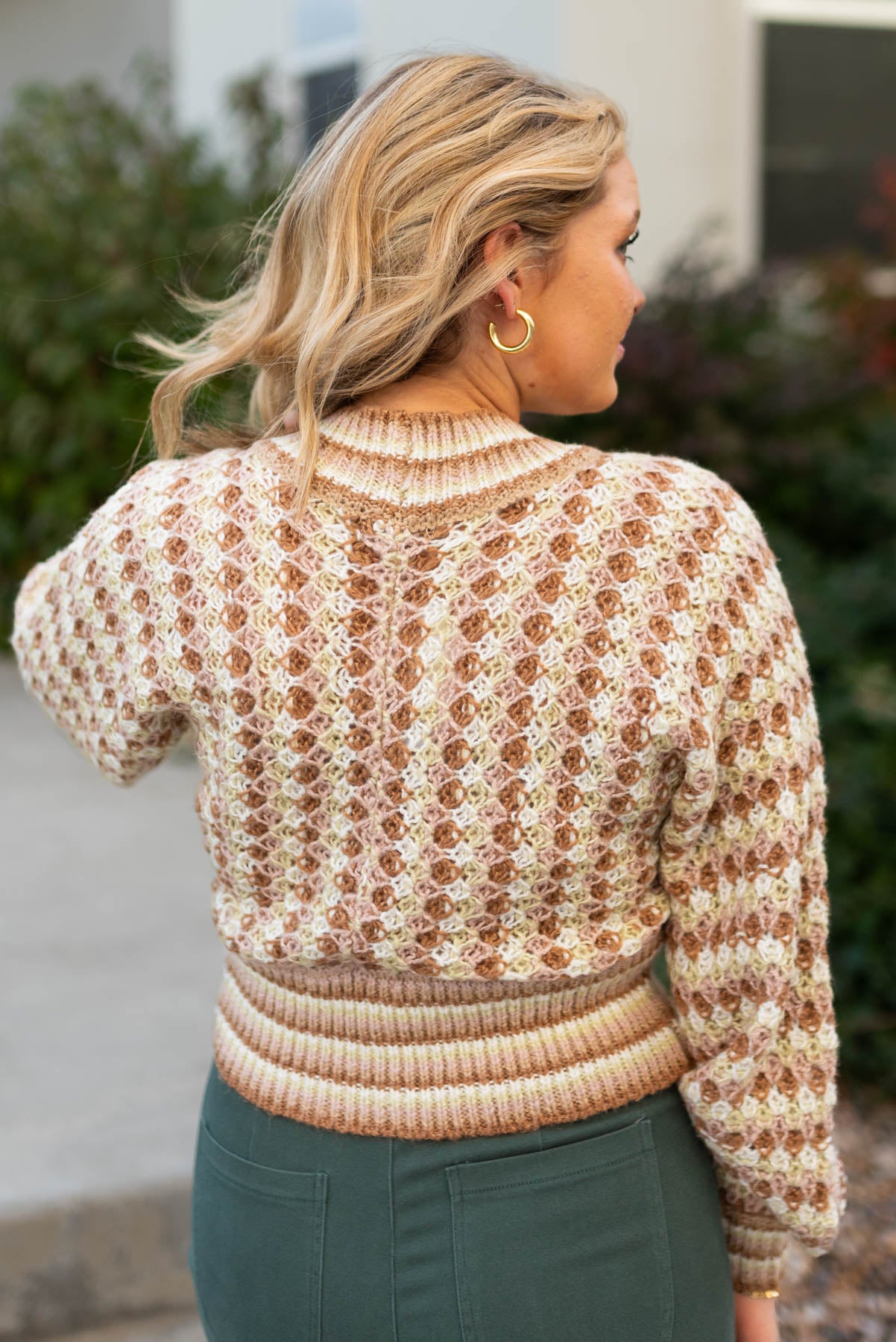 Back view of a khaki cardigan