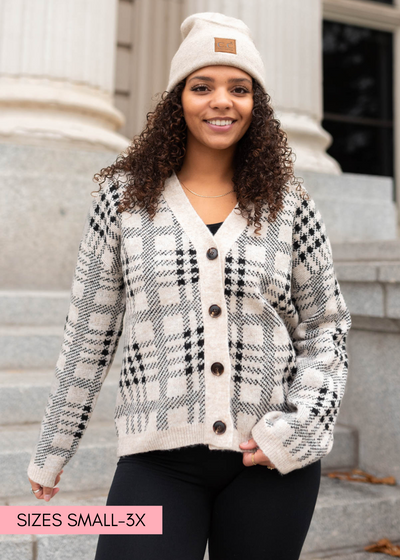V-neck taupe button down cardigan with long sleeves and black plaid pattern