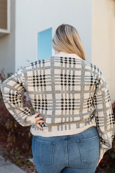 Back view of the plus size taupe button down cardigan