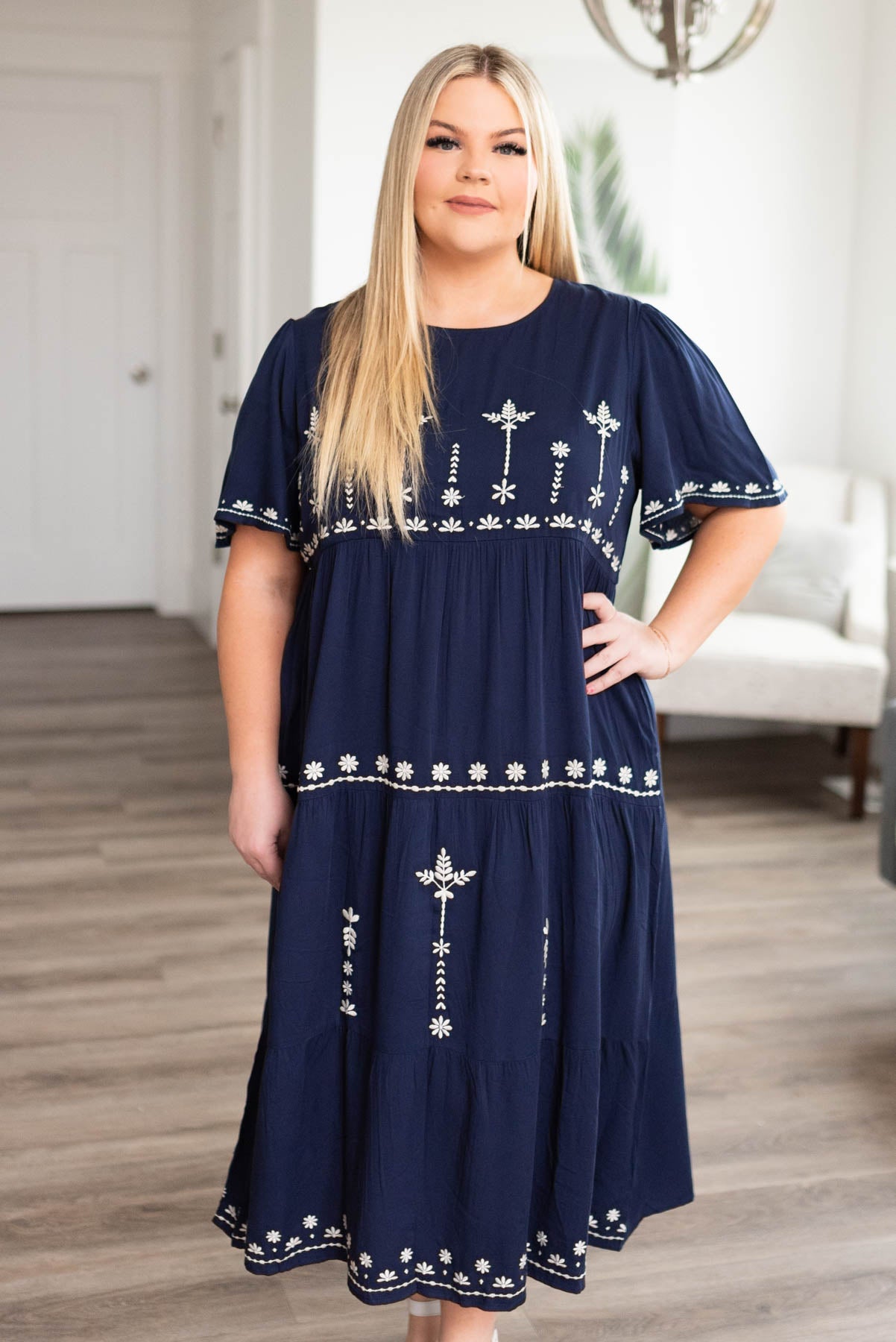 Plus size navy embroidered dress with white embroidered pattern