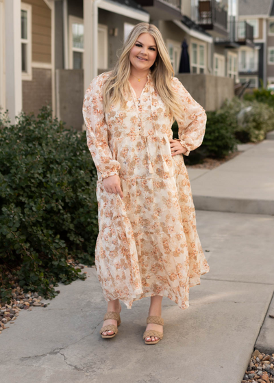 Plus size long sleeve tiered peach flower dress with ties at the neck