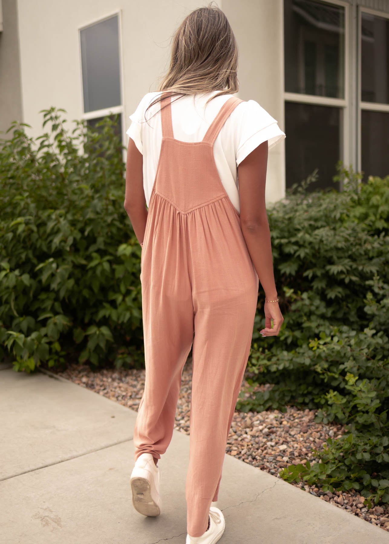 Back view of a clay jumpsuit