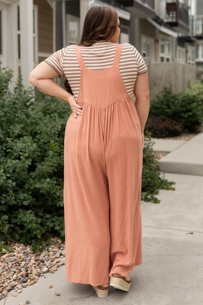 Back view of a plus size clay jumpsuit