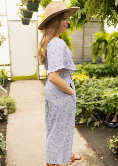 Side view of a periwinkle jumpsuit