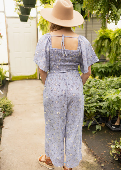 Back view of a periwinkle jumpsuit