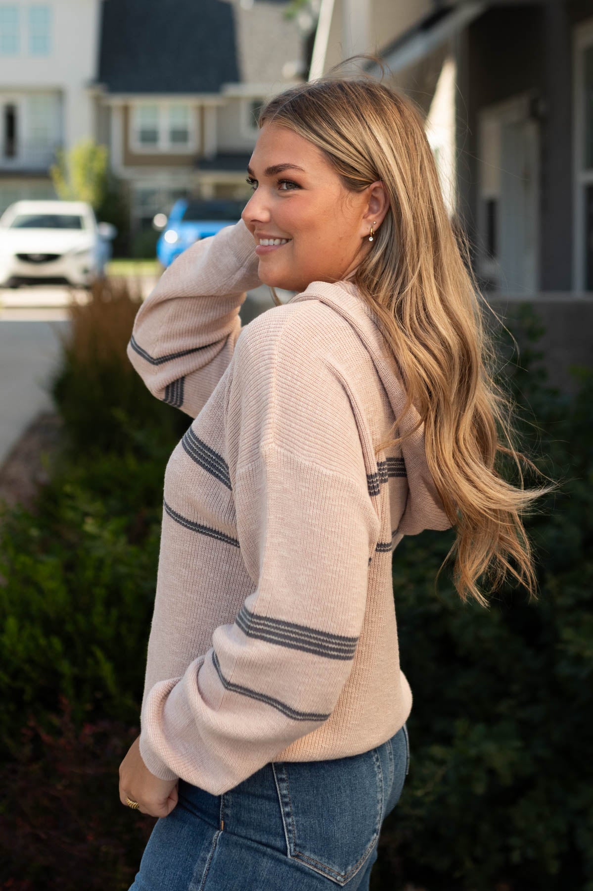 Side view of a long sleeve vintage rose hoodie