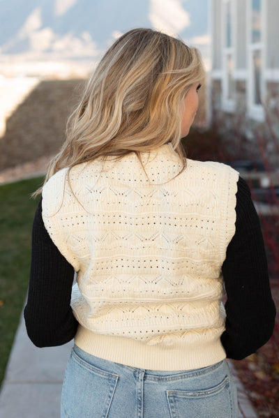 Back view of the ivory knit sweater vest