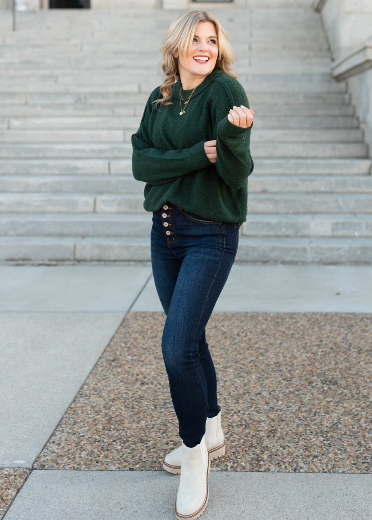 Hunter green knit pullover with long sleeves