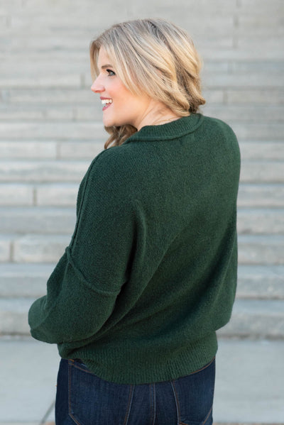 Back view of the hunter green knit pullover