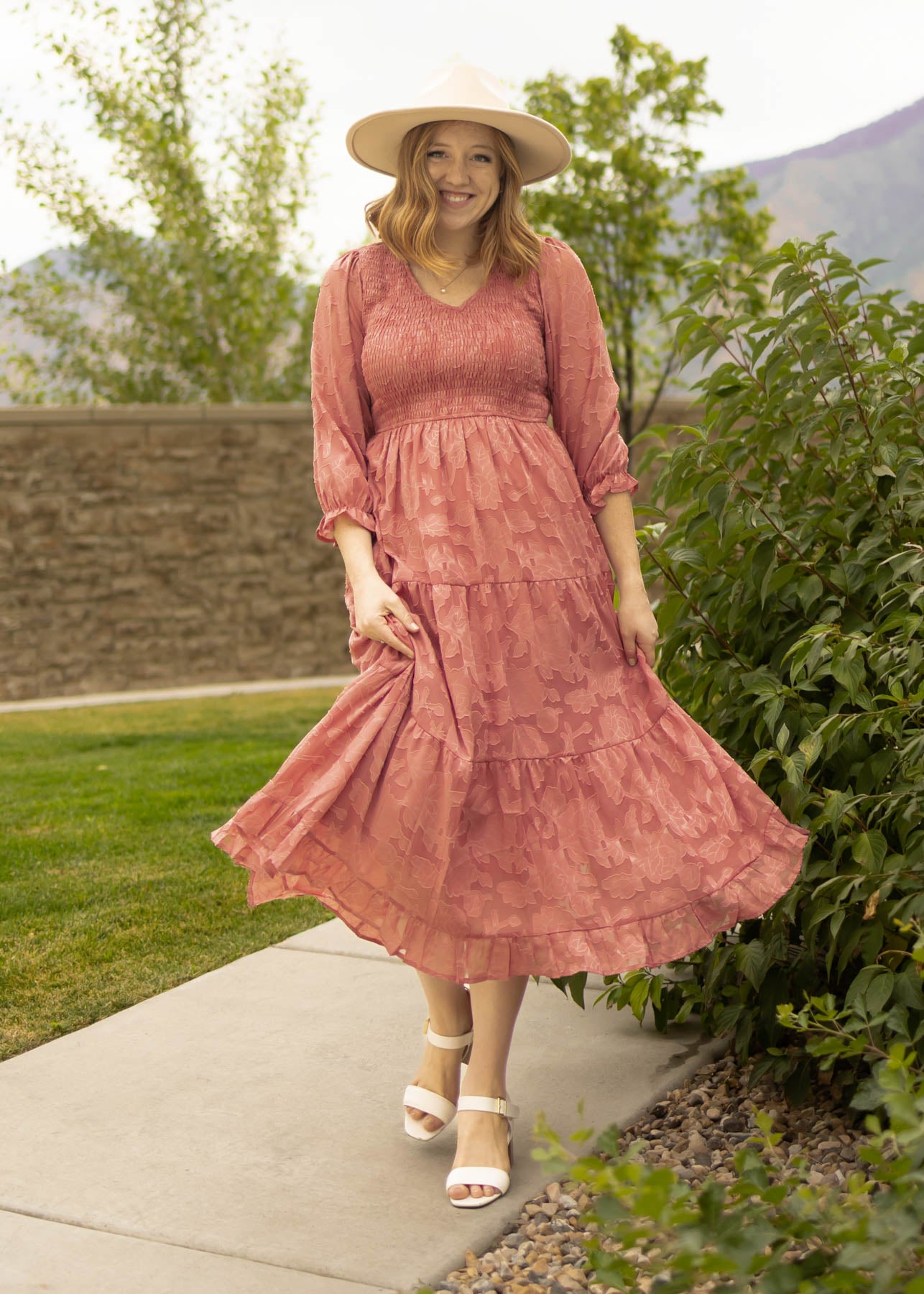 Dusty rose dress with a smocked bodice