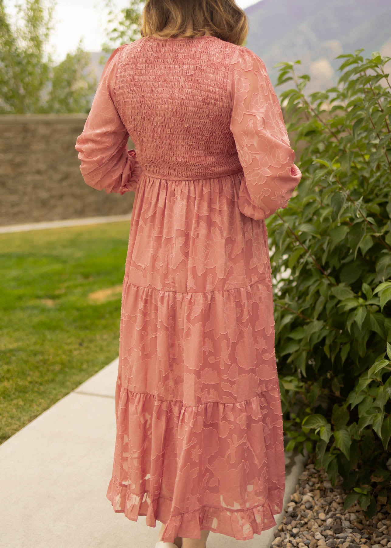 Back view of a dusty rose dress