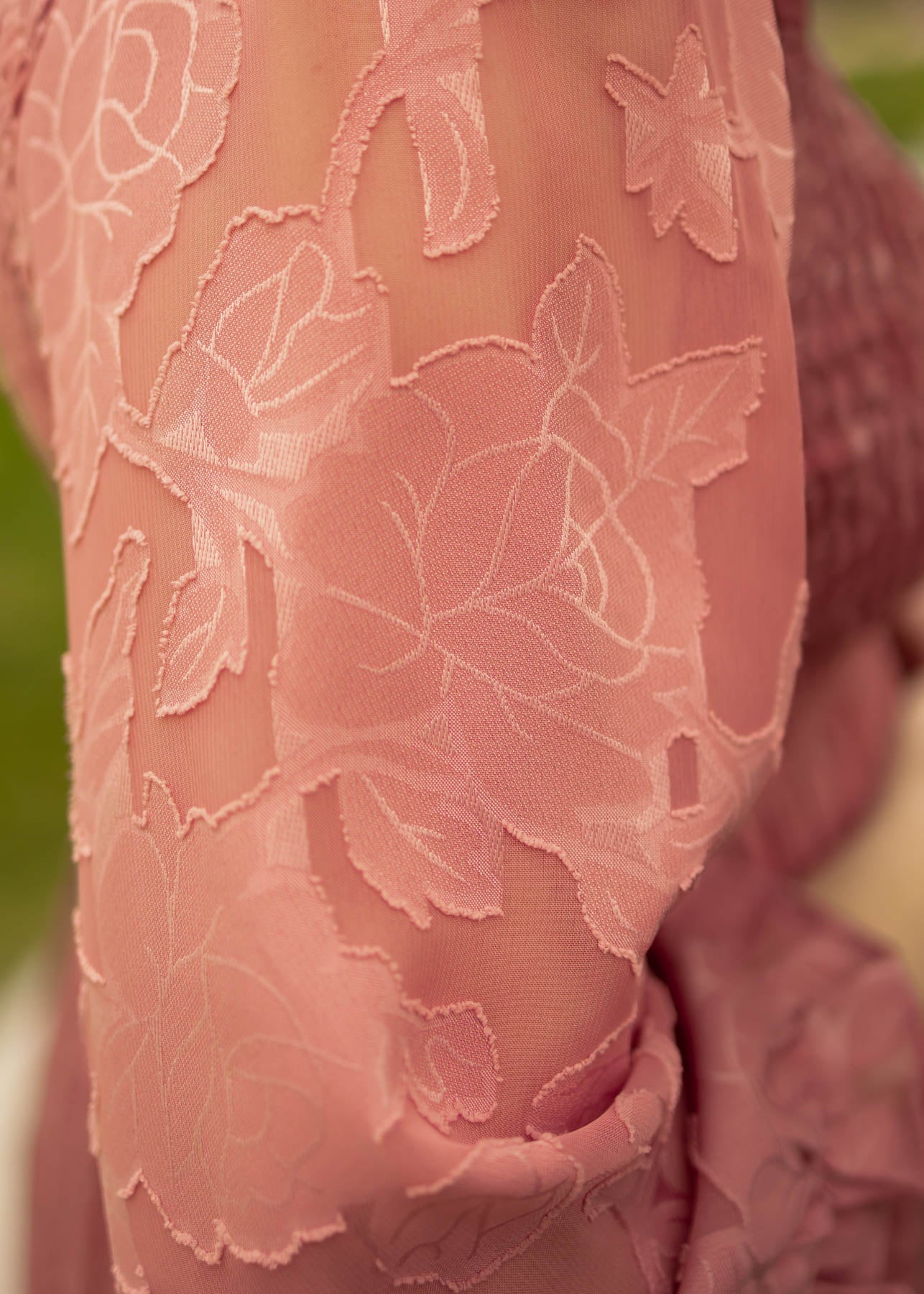 Fabric of a dusty rose dress