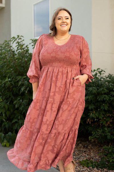 Plus size dusty rose dress with smocked bodice, pockets, tiered skirt and v-neck