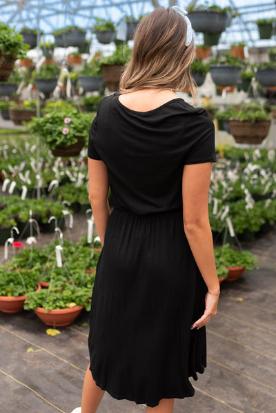 Back view of the black drawstring dress