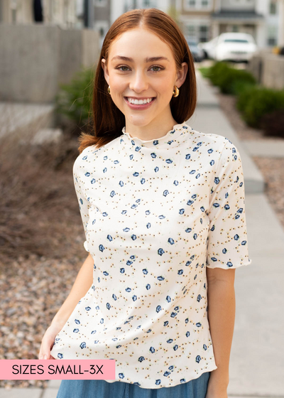 Cream floral top with short sleeves