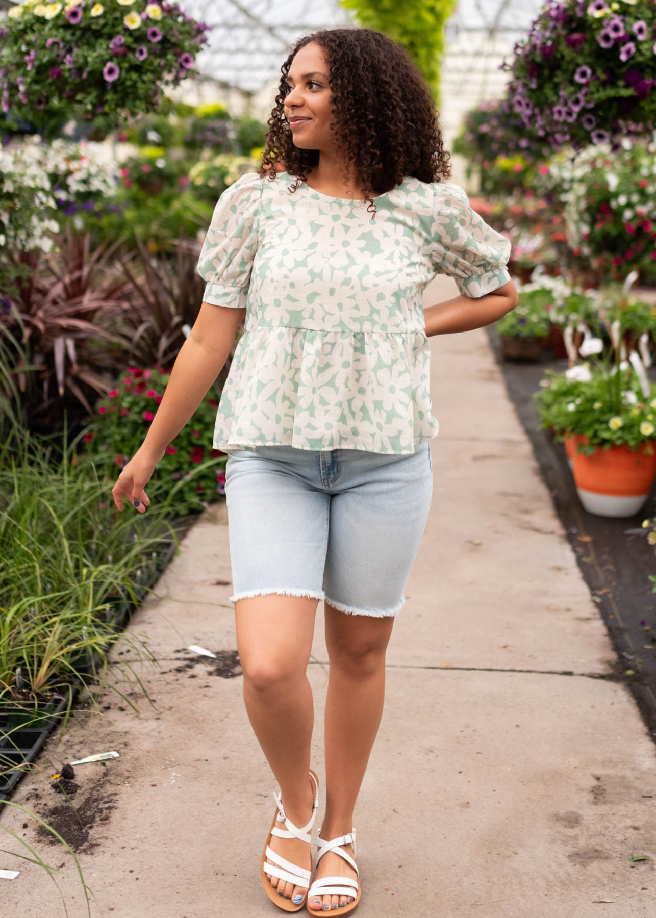 Green floral blouse with short sleeves