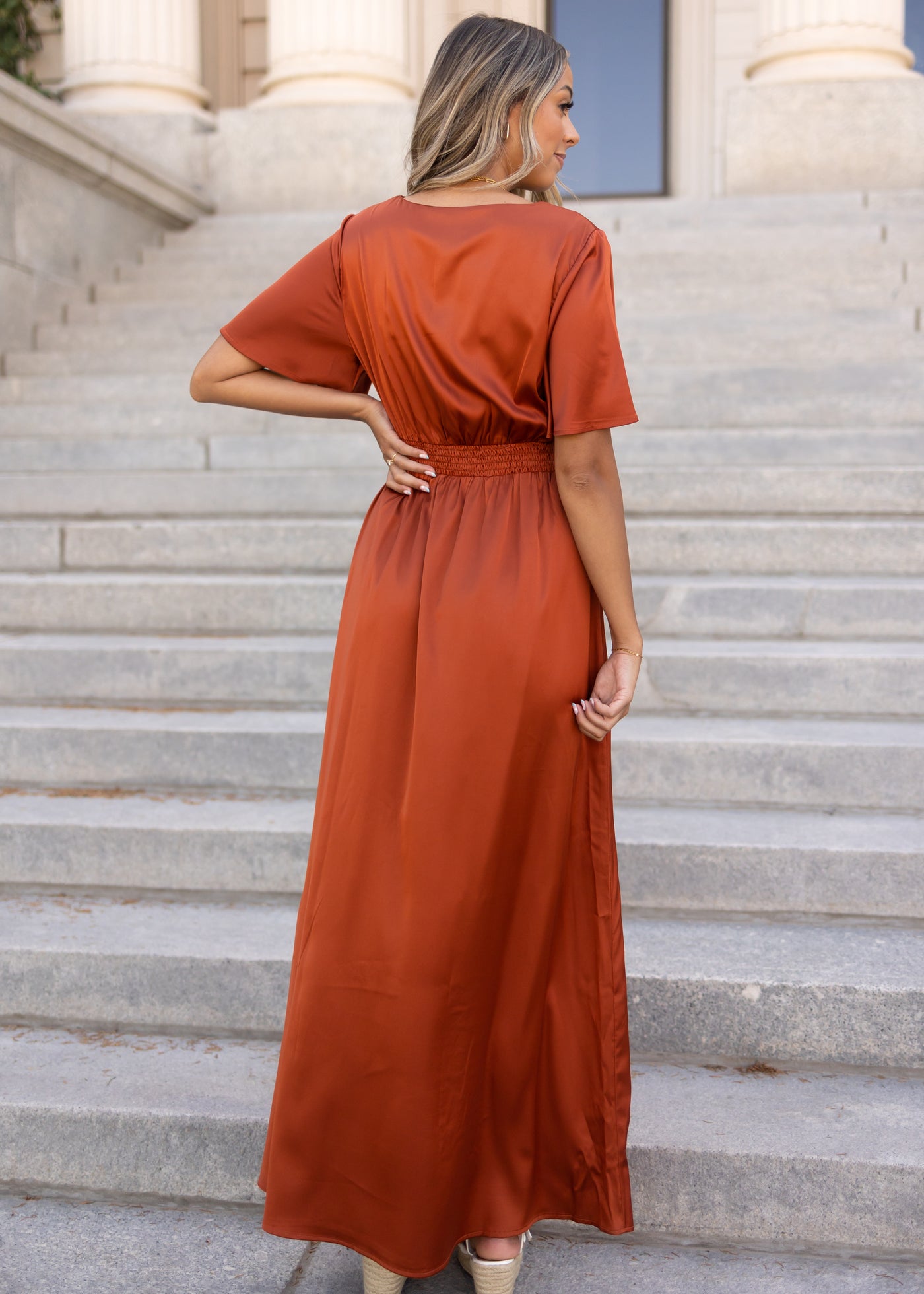 Back view of a satin brick short sleeve dress