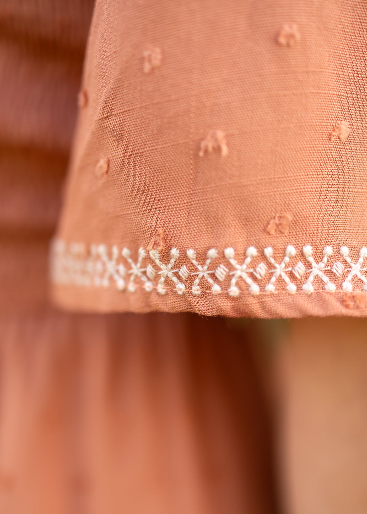 Short sleeve terracotta dress with cream embroidery