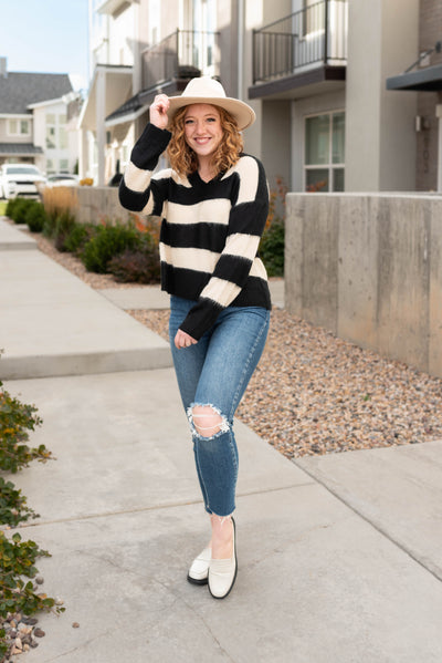 Ivory and black sweater with wide stripes