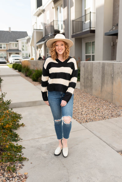 Black sweater with ivory stripes