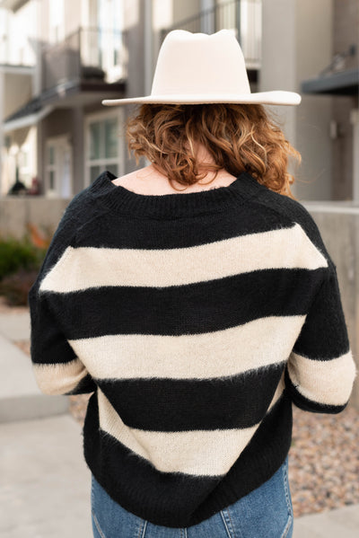 Back view of the black sweater