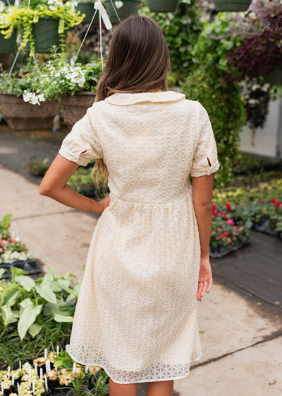 Back view of the cream pattern dress