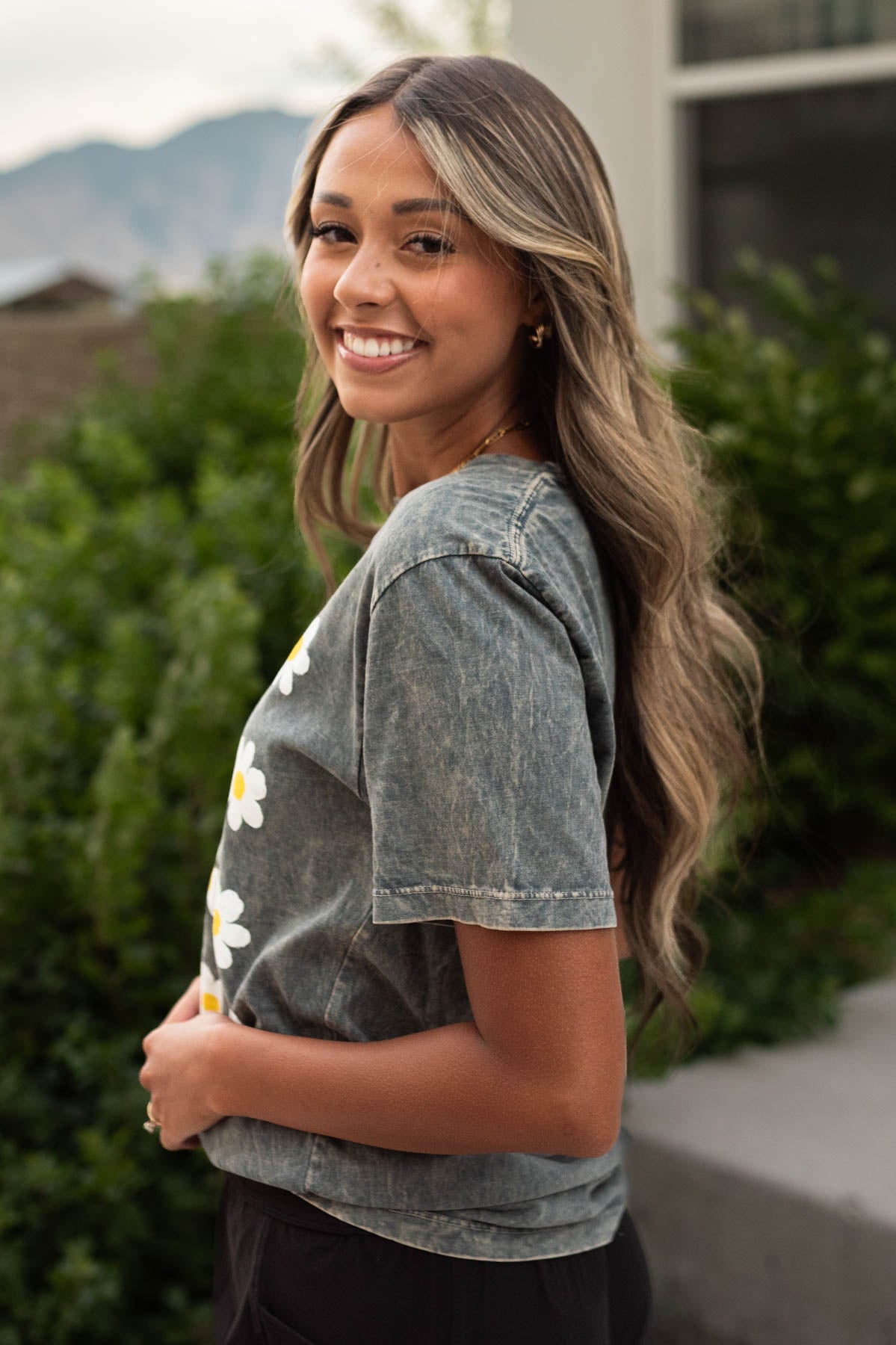 Side view of a stone grey tee