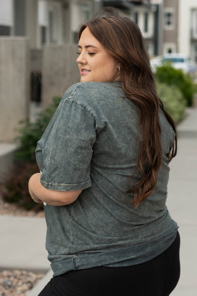 Side view of a plus size stone grey tee