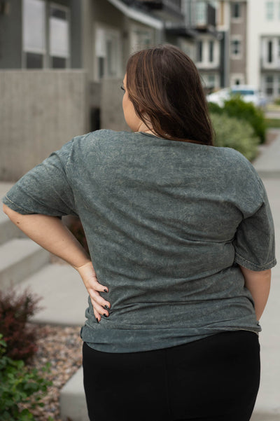 Back view of a stone grey tee